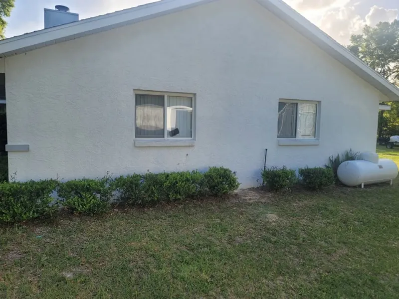Bright stucco siding after a soft wash